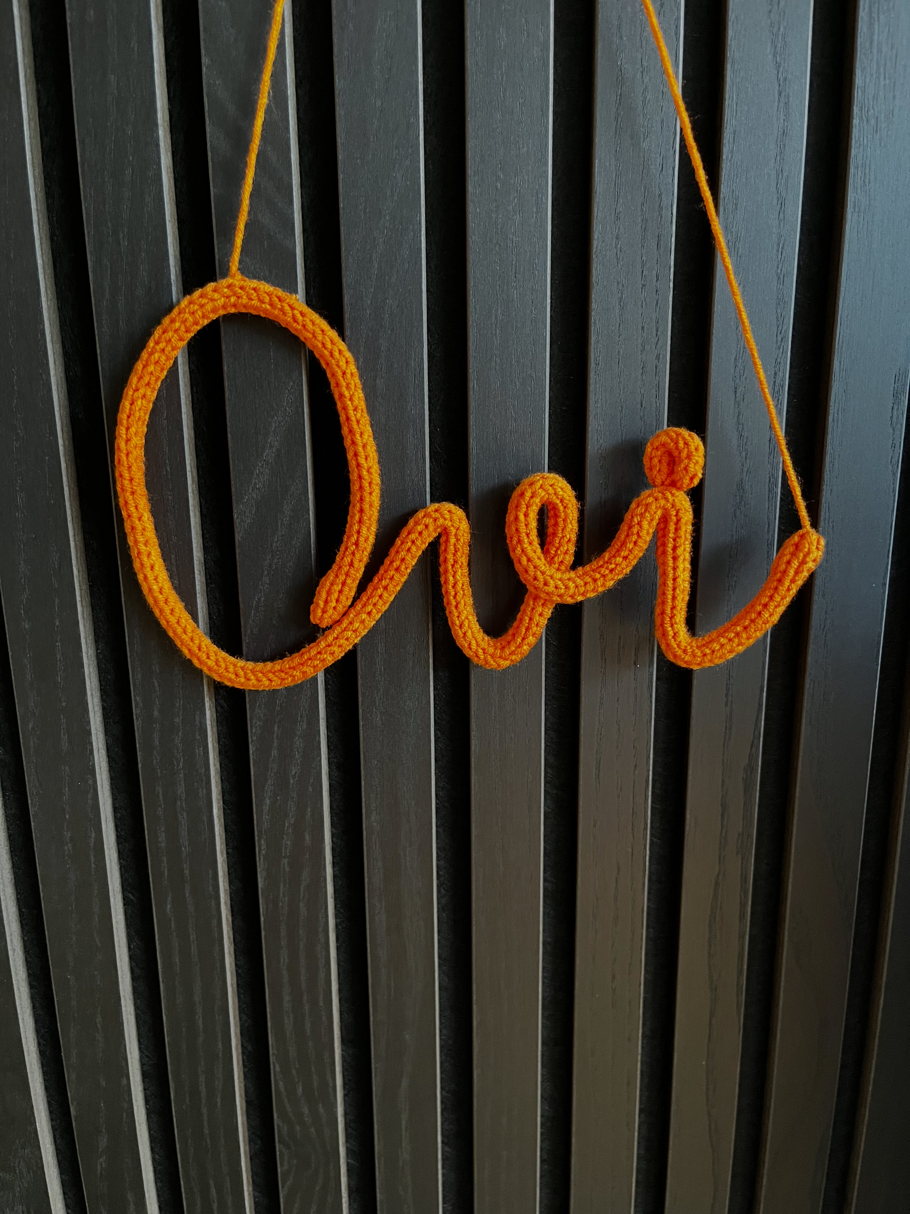 naamhanger (3 letters)