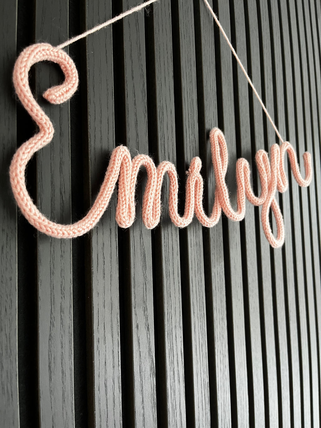 naamhanger (6 letters)