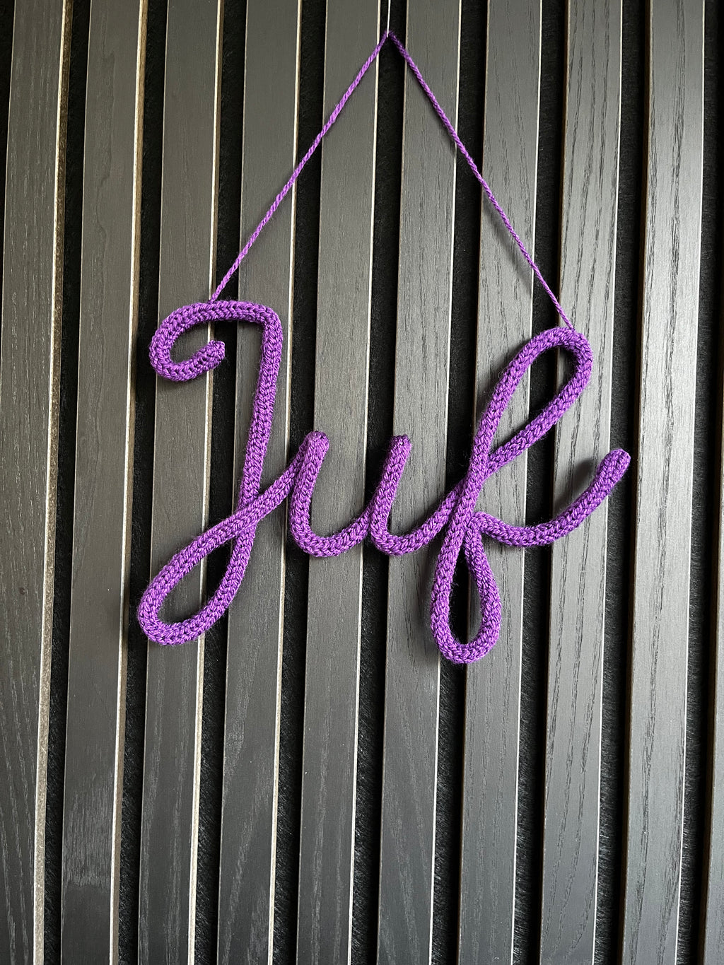 naamhanger (3 letters)