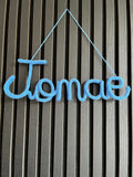 naamhanger (5 letters)