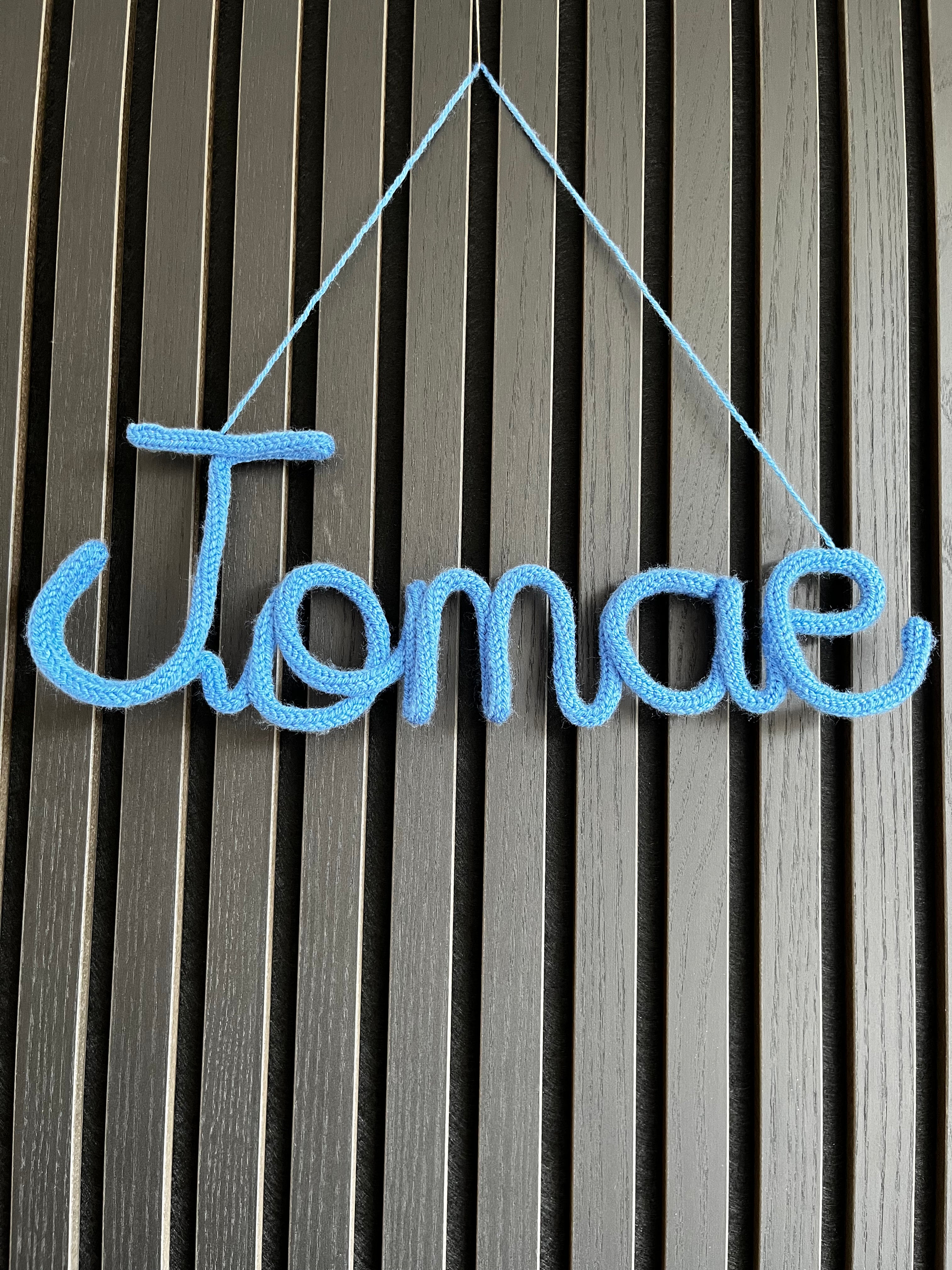naamhanger (5 letters)